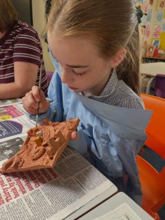 Year 6 are adding a little sparkle to clay tiles. We are having a day of art, focusing on Gustav Klimt.